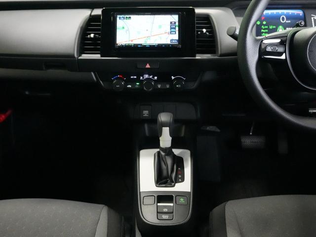 フィット ベーシック　ホンダセンシング　社外メモリナビ　レーダークルーズ　レーンキープアシスト　バックカメラ　ソナーセンサー　ウインカーミラー　スマートキー　プッシュスタート　ＥＴＣ　電動格納ミラー　ＷＳＲＳ　ＡＢＳ（9枚目）