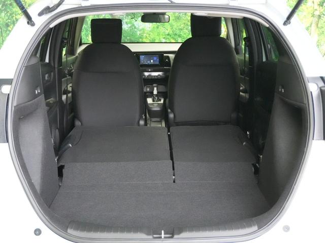 フィット ベーシック　ホンダセンシング　社外メモリナビ　レーダークルーズ　レーンキープアシスト　バックカメラ　ソナーセンサー　ウインカーミラー　スマートキー　プッシュスタート　ＥＴＣ　電動格納ミラー　ＷＳＲＳ　ＡＢＳ（49枚目）