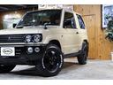 アクティブフィールドエディション　丸目４灯リンクスフェイス換装　ターボ・パートタイム４ＷＤ・全塗装・ワンオーナー・新品マッドスタータイヤ・純正アルミホイール半艶ブラック塗装・テールレンズブラックアウト・キーレス・フォグランプ・ナビ（20枚目）