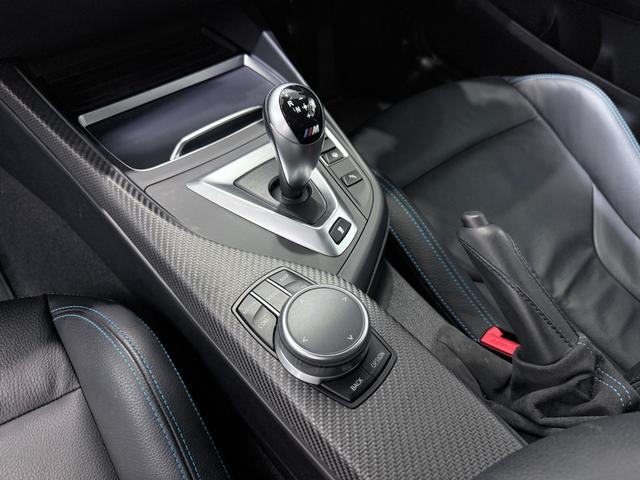 Ｍ２ コンペティション　法人ワンオーナー　希少・電動ガラスサンルーフ　Ｄ整備車　アダプティブＬＥＤヘッドライト　Ｍスポーツエキゾーストシステム　ハーマンカードン　Ｙスポークスタイリング７８８Ｍ・１９インチＡＷ　屋内保管　禁煙（19枚目）