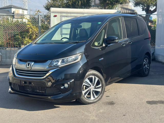 フリードハイブリッド ハイブリッド・Gホンダセンシング ユーザー買取車/ワンオーナー/純正ナビ/フルセグ/CD・DVD再生/BT接続/Bカメラ/ETC/ホンダセンシング/衝突軽減ブレーキ/レーンキープアシスト/両側パワースライドドア/ハーフレザーシート(5枚目)