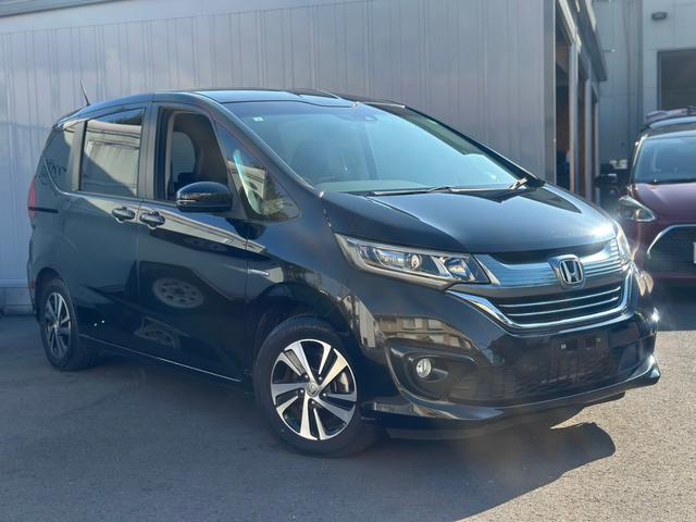 フリードハイブリッド ハイブリッド・Gホンダセンシング ユーザー買取車/ワンオーナー/純正ナビ/フルセグ/CD・DVD再生/BT接続/Bカメラ/ETC/ホンダセンシング/衝突軽減ブレーキ/レーンキープアシスト/両側パワースライドドア/ハーフレザーシート(7枚目)