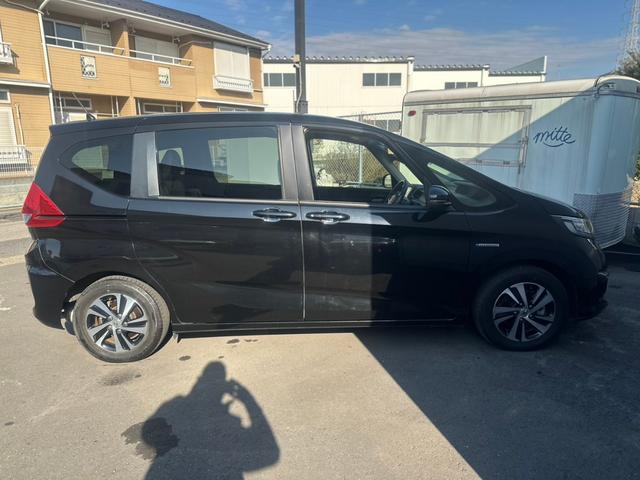 フリードハイブリッド ハイブリッド・Gホンダセンシング ユーザー買取車/ワンオーナー/純正ナビ/フルセグ/CD・DVD再生/BT接続/Bカメラ/ETC/ホンダセンシング/衝突軽減ブレーキ/レーンキープアシスト/両側パワースライドドア/ハーフレザーシート(11枚目)