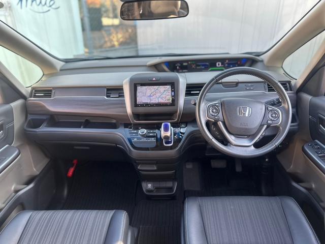 フリードハイブリッド ハイブリッド・Gホンダセンシング ユーザー買取車/ワンオーナー/純正ナビ/フルセグ/CD・DVD再生/BT接続/Bカメラ/ETC/ホンダセンシング/衝突軽減ブレーキ/レーンキープアシスト/両側パワースライドドア/ハーフレザーシート(14枚目)