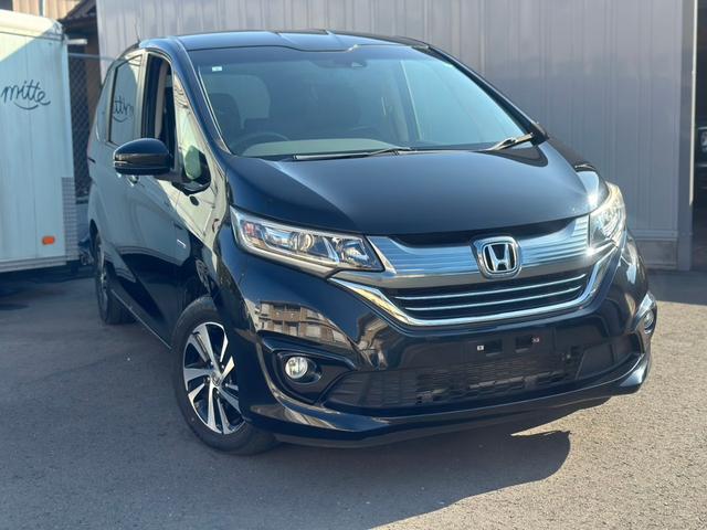 フリードハイブリッド ハイブリッド・Gホンダセンシング ユーザー買取車/ワンオーナー/純正ナビ/フルセグ/CD・DVD再生/BT接続/Bカメラ/ETC/ホンダセンシング/衝突軽減ブレーキ/レーンキープアシスト/両側パワースライドドア/ハーフレザーシート(24枚目)