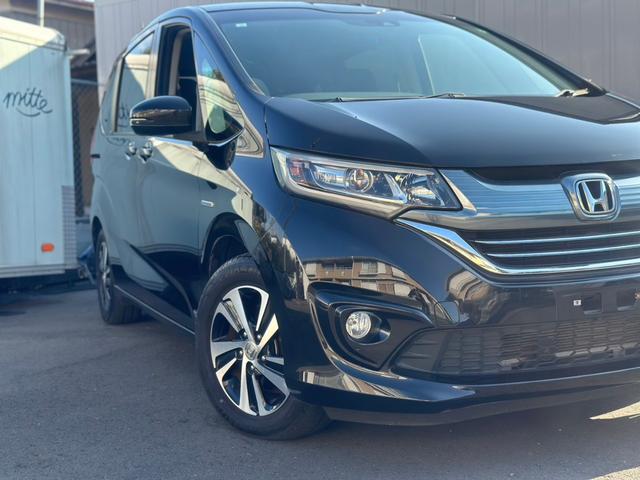 フリードハイブリッド ハイブリッド・Gホンダセンシング ユーザー買取車/ワンオーナー/純正ナビ/フルセグ/CD・DVD再生/BT接続/Bカメラ/ETC/ホンダセンシング/衝突軽減ブレーキ/レーンキープアシスト/両側パワースライドドア/ハーフレザーシート(27枚目)
