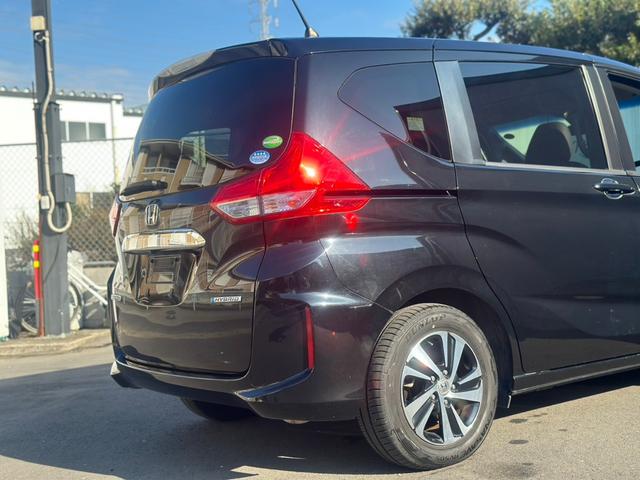 フリードハイブリッド ハイブリッド・Gホンダセンシング ユーザー買取車/ワンオーナー/純正ナビ/フルセグ/CD・DVD再生/BT接続/Bカメラ/ETC/ホンダセンシング/衝突軽減ブレーキ/レーンキープアシスト/両側パワースライドドア/ハーフレザーシート(33枚目)