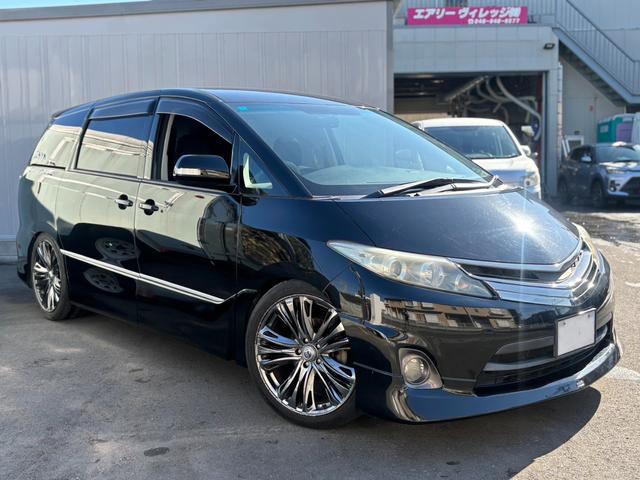 エスティマ アエラス ユーザー買取車/タナベ車高調/RAYS VERSUS 20インチAW/モデリスタフロントスポイラー/両側パワスラ/メーカーHDDナビ/フルセグ/CD・DVD再生/BT接続/ETC/Bカメラ/車検整備付(6枚目)