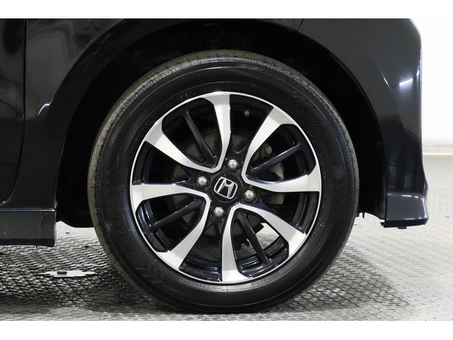 N-BOXカスタム G・Lホンダセンシング 認定中古車 1年保証付 ナビ Bカメラ ドラレコ ETC 運転支援 追従走行 Bluetooth音楽 地デジTV 電動格納ドアミラー オートLED 助手席エアバッグ 車線逸脱警報装置 キーレス DVD(7枚目)