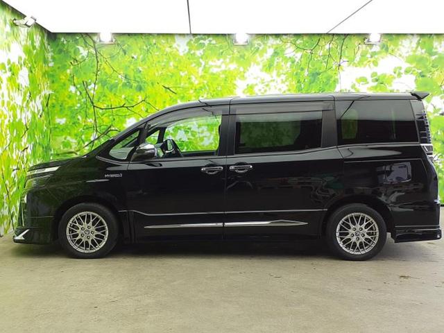 ヴォクシー ハイブリッドZSキラメキ2 エアロ/保証書/純正 10インチ SDナビ/フリップダウンモニター/衝突安全装置/両側電動スライドドア/シートヒーター 前席/車線逸脱防止支援システム/パーキングアシスト バックガイド フルエアロ(2枚目)