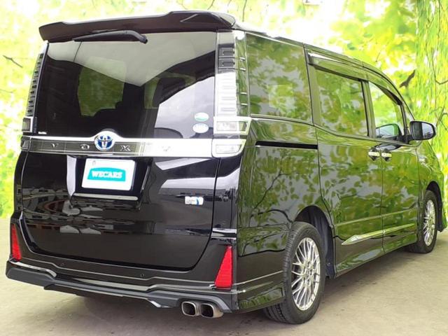 ヴォクシー ハイブリッドZSキラメキ2 エアロ/保証書/純正 10インチ SDナビ/フリップダウンモニター/衝突安全装置/両側電動スライドドア/シートヒーター 前席/車線逸脱防止支援システム/パーキングアシスト バックガイド フルエアロ(3枚目)