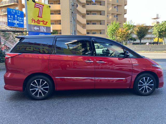 エスティマハイブリッド アエラス スマート ツートンカラー/4WD/純正アルミ有/レザーシート/純正ナビ/フリップダウンモニター/スマートキー/ETC/両側自動ドア(21枚目)