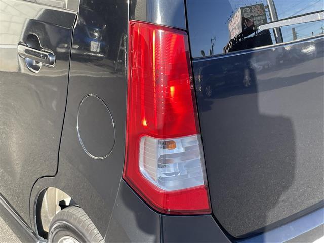 ワゴンＲ ＦＸリミテッド　プッシュスタート　スマートキー×２　ＣＤプレイヤー　ドアバイザー　電動格納ミラー　オートエアコン　アクセサリーソケット　オートライト　純正１４インチアルミホイール　保証書　取扱説明書（34枚目）