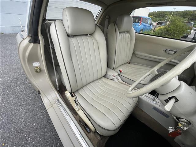 フィガロ ベースグレード フルオープントップ ターボ ハロゲン 本革シート AC パワーステアリング パワーウィンドウ CD(24枚目)