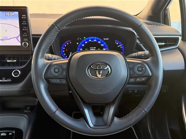 カローラツーリング ハイブリッド　ダブルバイビー　純正ディスプレイオーディオ　バックカメラ　クルーズコントロール　前席シートヒーター　ビルトインＥＴＣ　ハンドルヒーター　ＡＣ１００Ｖ　コーナーセンサー　衝突被害軽減ブレーキ　レーンキープアシスト（5枚目）