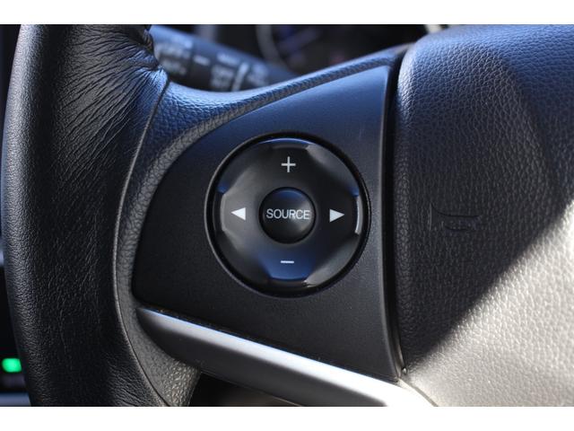 フィット １３Ｇ・Ｌパッケージ　軽減ブレーキ　安全ボディ　ＢＴ接続　盗難警報装置　禁煙　１オ－ナ－　Ｂカメ　Ｓキー　フルセグ　フルオートエアコン　整備記録簿　ナビＴＶ　リモコンキー　サイドＳＲＳ　横滑り防止機能　エアバック　アイスト（15枚目）