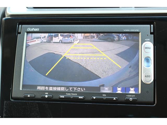 フィット １３Ｇ・Ｆパッケージ　電動格納式ドアミラー　ブルートゥース　イモビ　安全ボディ　ＤＶＤ再生可能　スマ－トキ－　記録簿有り　ＶＳＡ　ＥＴＣ付き　禁煙　助手席エアバッグ　メモリーナビ　Ｒカメラ　オートエアコン　エアバック　ＰＳ（10枚目）