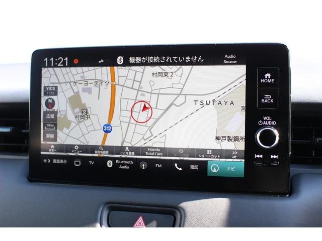 ヴェゼル e:HEV Z 盗難防止装置 AUX 1オーナー ドラレコ付き Rカメラ 記録簿 フルセグテレビ 衝突安全ボディ スマ-トキ- Pセンサー サイドエアバッグ ナビTV フルオートエアコン 衝突軽減ブレ-キ 4WD車(4枚目)