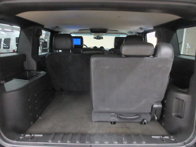 ハマーＨ２ ４ＷＤ　０５年モデル　サンルーフ　黒革シート　アルパインナビ　フルセグ　後席モニター　ＥＴＣ　クルーズコントロール　音楽録音　ディスク再生　シートヒーター　ＸＥＮＯＮエアロ　２０インチアルミ　タイミングチェーン（58枚目）