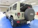 ジープ・ラングラーアンリミテッド サハラ　４ＷＤ　後期型　純正ゴビカラー　社外ナビ　フルセグ　Ｂｌｕｅｔｏｏｔｈオーディオ　サイド・バックカメラ　ＥＴＣ　音楽録音　ディスク再生　クルーズコントロール　１８インチアルミ　タイミングチェーン　レギュラーガソリン車（5枚目）