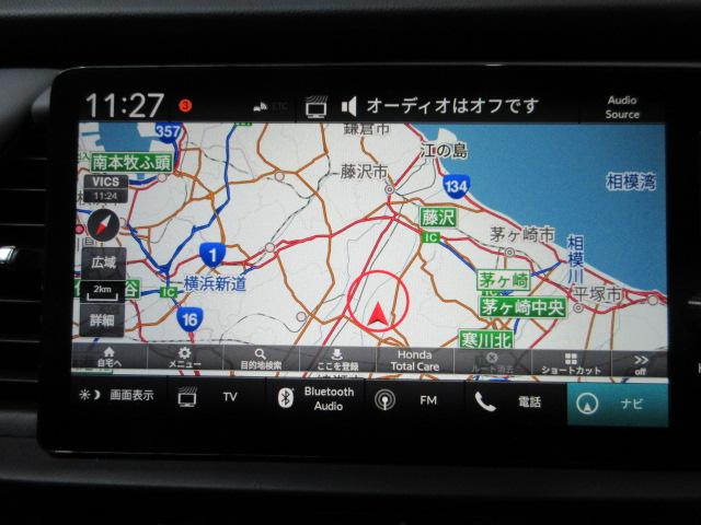 フィット e:HEVRS HondaSENSING 前後ドラレコ メモリーナビ リアカメラ ETC2.0 Bluetooth USB パドルシフト 純正アルミ ドアバイザー ワンオーナー エアバッグ ナビ&TV Dレコ ABS(3枚目)