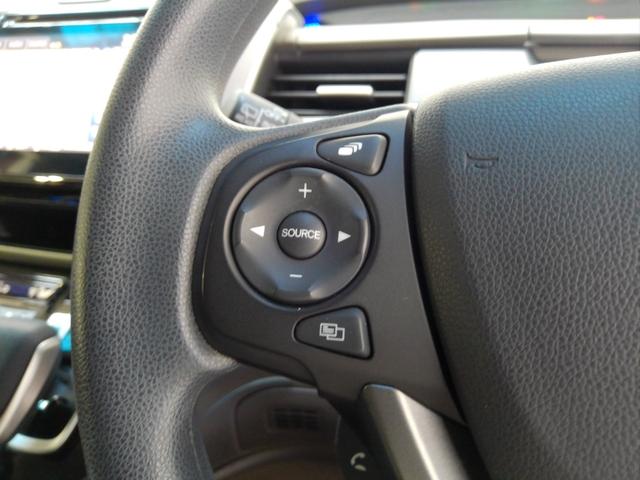 フリードハイブリッド ハイブリッド・Ｇホンダセンシング　６人　前後ドラレコ　メモリーナビ　リアカメラ　ＥＴＣ　ドアバイザー　軽減ブレーキ　キーフリーシステム　電動格納式ドアミラー　Ｂｌｕｅｔｏｏｔｈ音楽　ミュージックプレイヤー接続可　衝突安全ボディ　記録簿（9枚目）