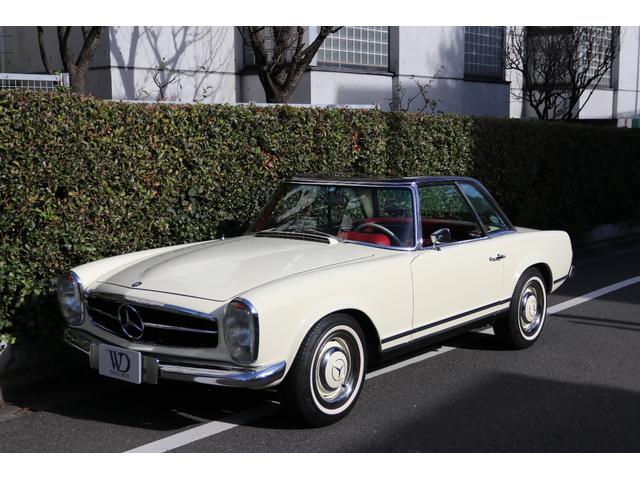 ２３０ＳＬ　正規輸入　／　ウエスタン自動車　／　左ハンドル　／　４速マニュアルミッション　／　レッド革シート　／　純正ハードトップ　／　レッドソフトトップ　／　クーラー付(3枚目)