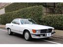 ５００ＳＬ　１９８９年最終モデル　／　新車並行車　／　ネイビー本革シート　／　ウッドパネル　／　純正アルミホイール　／　純正ハードトップ　／　４人乗車(21枚目)