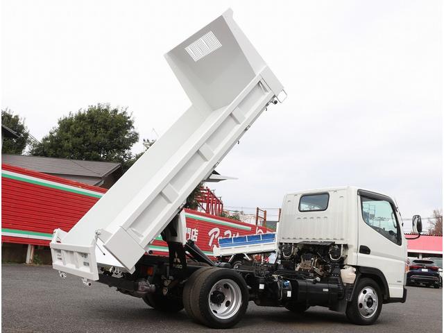 キャンター 全低床ダンプ　２ｔ　全低床強化ダンプ　５ＭＴ　衝突軽減ブレーキ付き！　車線逸脱警報装置　トラクションコントロール　新明和製ＤＲ２－０１１０ＳＹ　３方開　中間ピン　キーレス＆スペアキー　左電動格納ミラー　ＥＴＣ（30枚目）