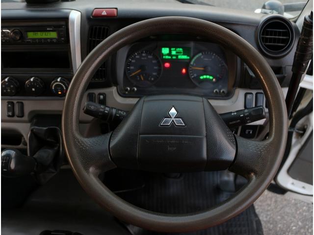 キャンター 全低床ダンプ　２ｔ　全低床強化ダンプ　５ＭＴ　衝突軽減ブレーキ付き！　車線逸脱警報装置　トラクションコントロール　新明和製ＤＲ２－０１１０ＳＹ　３方開　中間ピン　キーレス＆スペアキー　左電動格納ミラー　ＥＴＣ（52枚目）