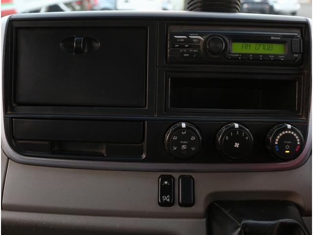 キャンター 全低床ダンプ　２ｔ　全低床強化ダンプ　５ＭＴ　衝突軽減ブレーキ付き！　車線逸脱警報装置　トラクションコントロール　新明和製ＤＲ２－０１１０ＳＹ　３方開　中間ピン　キーレス＆スペアキー　左電動格納ミラー　ＥＴＣ（56枚目）