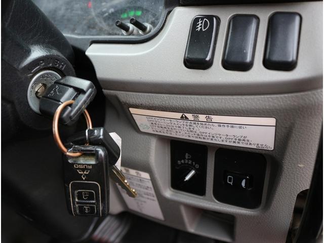 キャンター 　２ｔ積載　全低床強化ダンプ　５ＭＴ　衝突軽減ブレーキ　車線逸脱警報装置　トラクションコントロール　キーレス＆スペアキー　左電動格納ミラー　ＥＴＣ　３方開　中間ピン２本　車両総重量４９２５キロ（57枚目）