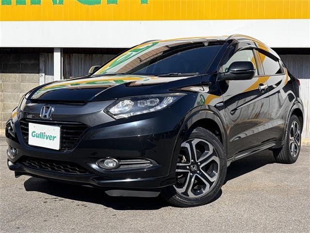 ヴェゼル ハイブリッドＺ　１オーナー　ＣＴＢＡ　メーカーナビ　Ｂｌｕｅｔｏｏｔｈ　ＨＤＭＩ　フルセグ　ＤＶＤ　黒革シート　前席シートヒーター　パドルシフト　ルーフレール　スマートキー　プッシュスタート　革巻きステアリング（2枚目）