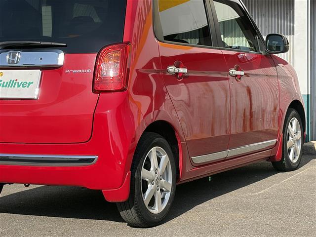 N-ONE プレミアム・Lパッケージ ワンオーナー 赤x黒ツートン色 社外ナビ スマートキー プッシュスタート HIDヘッドライト フォグライト ドライブレコーダー前後 革巻きステアリング ETC オートライト 電格ミラー ターンミラー(11枚目)