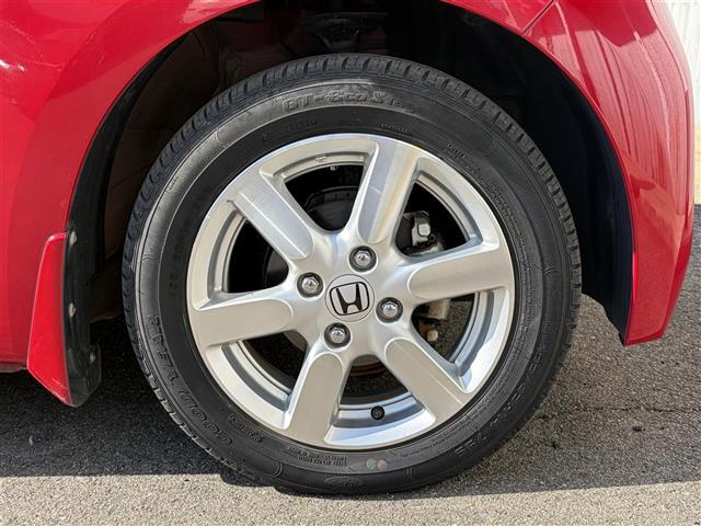 N-ONE プレミアム・Lパッケージ ワンオーナー 赤x黒ツートン色 社外ナビ スマートキー プッシュスタート HIDヘッドライト フォグライト ドライブレコーダー前後 革巻きステアリング ETC オートライト 電格ミラー ターンミラー(16枚目)