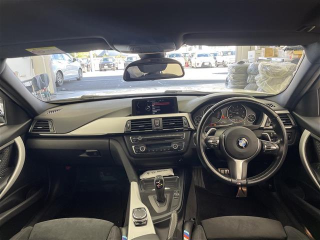 3シリーズ 320dツーリング Mスポーツ 純正ナビ 社外フルセグ パワーバックドア アダプティブクルーズコントロール パワーシート シートメモリー インテリジェントセーフティー バックカメラ ETC一体型ルームミラー コーナーセンサー 禁煙車(2枚目)