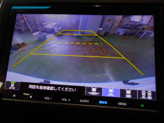 フリードハイブリッド ハイブリッド・クロスターホンダセンシング　禁煙　ワンオーナー　前後カメラ　アドバンスドルームミラ－　追突軽減ブレーキ　サイドエアバッグ　９型ナビ　シートヒーター　スマートキー　ＥＴＣ２．０　フルセグ　ＤＶＤ再生　両パワースライド　ＤＶＤ再生（2枚目）