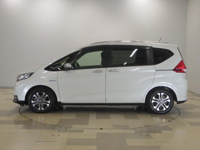 フリードハイブリッド ハイブリッド・クロスターホンダセンシング　禁煙　ワンオーナー　前後カメラ　アドバンスドルームミラ－　追突軽減ブレーキ　サイドエアバッグ　９型ナビ　シートヒーター　スマートキー　ＥＴＣ２．０　フルセグ　ＤＶＤ再生　両パワースライド　ＤＶＤ再生（21枚目）