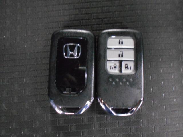 ステップワゴンスパーダ スパーダホンダセンシング リア席モニター 禁煙 ワンオーナー 追突軽減ブレーキ 9型ナビ 前後ドラレコ フルセグ Bluetooth ミュージックラック DVD再生 リアカメラ スマートキー 両パワースライド ドアバイザー(15枚目)