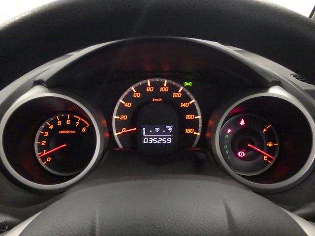 フィット Ｇ　禁煙車　ワンオーナー　ナビ　リアカメラ　Ｂｌｕｅｔｏｏｔｈ　フルセグ　ＤＶＤ再生　ミュージックラック　ＥＴＣ　ドアバイザー　安全ボディ　電格ミラー　運転席助手席エアバッグ　Ｂモニター　キーレスリモコン（14枚目）