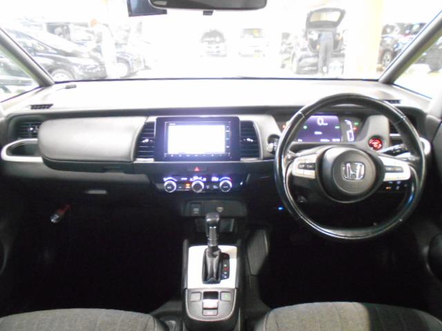 フィット ｅ：ＨＥＶホーム　・ハイブリッド車・ナビ・ＥＴＣ・ＬＥＤヘッドライト・ドライブレコーダー（社外）・横滑り防止装置・障害物センサー・ワンオーナー・禁煙車・ホンダセンシング・アクティブクルーズコントロール　クリソナ　１オナ（17枚目）
