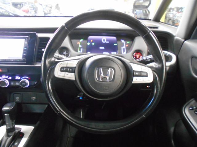 フィット ｅ：ＨＥＶホーム　・ハイブリッド車・ナビ・ＥＴＣ・ＬＥＤヘッドライト・ドライブレコーダー（社外）・横滑り防止装置・障害物センサー・ワンオーナー・禁煙車・ホンダセンシング・アクティブクルーズコントロール　クリソナ　１オナ（18枚目）