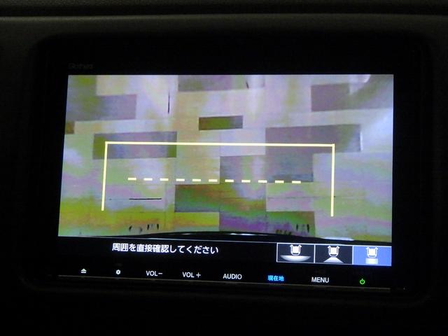 ヴェゼル ハイブリッドZ・ホンダセンシング 禁煙車・ミッドナイトブルービーム・メタリック・8インチナビ・前後ドラレコ・LEDヘッドライト・ホンダセンシング・ レーダーサポート 1オーナ- DVD再生機能 横滑り防止システム バックアイカメラ(3枚目)