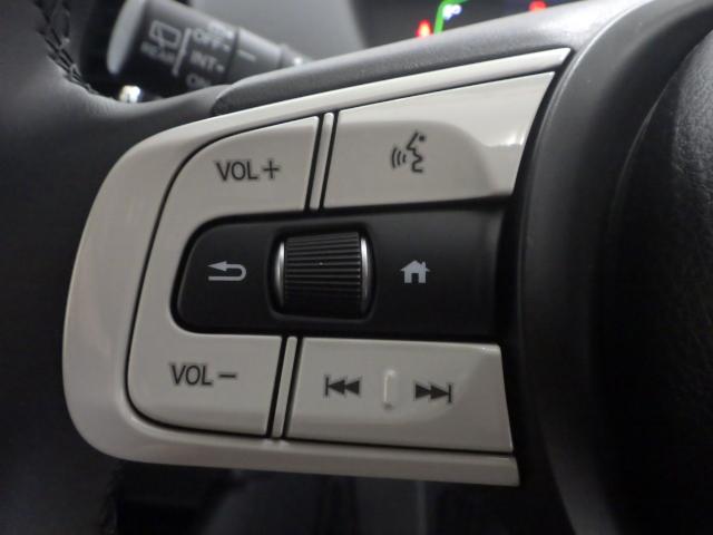 フィット e:HEVホーム 元当社試乗車・フィヨルドミスト・パール・禁煙車・9インチナビ・ETC・サイドエアバッグ・LEDヘッドライト・ホンダセンシング・ 前後誤発進抑制機能 助手席エアバッグ 運転席エアバッグ 1オナ ABS(6枚目)