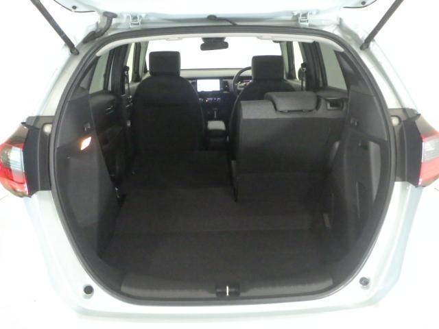 フィット e:HEVホーム 元当社試乗車・フィヨルドミスト・パール・禁煙車・9インチナビ・ETC・サイドエアバッグ・LEDヘッドライト・ホンダセンシング・ 前後誤発進抑制機能 助手席エアバッグ 運転席エアバッグ 1オナ ABS(22枚目)