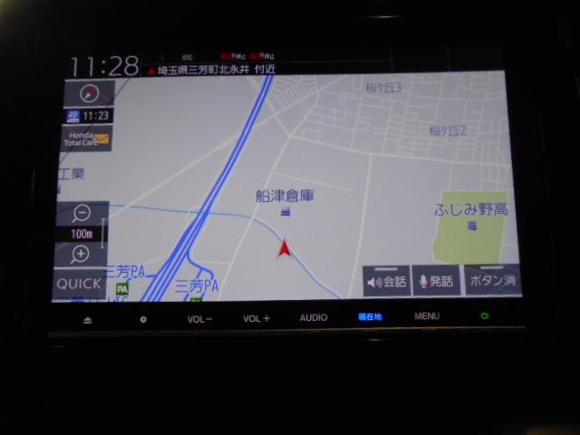 ステップワゴンスパーダ スパーダホンダセンシング　禁煙車　８人乗り　９インチナビ　フリップダウンモニター　ＥＴＣ　ドライブレコーダー　盗難防止　助手席エアバッグ　Ｗパワスラ　記録簿有　リアオートエアコン　地デジ　サイドエアバッグ　ＬＥＤライト　ＵＳＢ（3枚目）