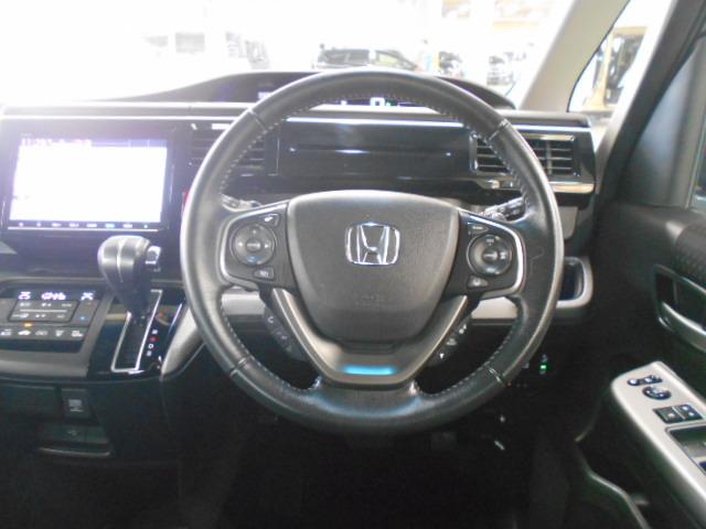 ステップワゴンスパーダ スパーダホンダセンシング　禁煙車　８人乗り　９インチナビ　フリップダウンモニター　ＥＴＣ　ドライブレコーダー　盗難防止　助手席エアバッグ　Ｗパワスラ　記録簿有　リアオートエアコン　地デジ　サイドエアバッグ　ＬＥＤライト　ＵＳＢ（18枚目）