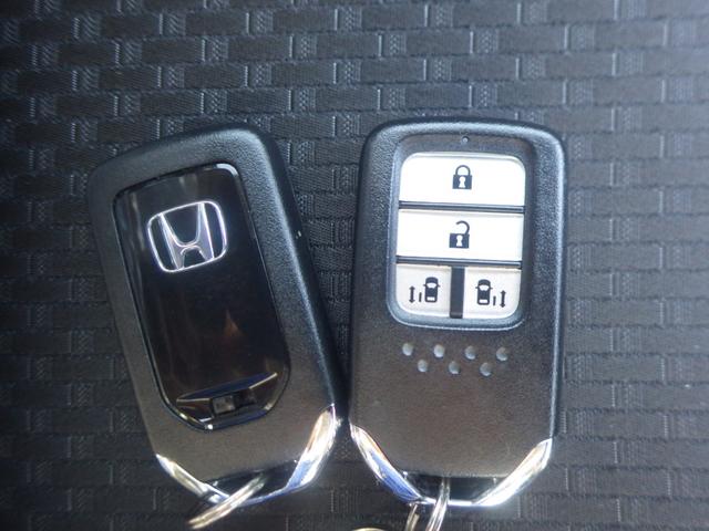 ステップワゴンスパーダ スパーダホンダセンシング　禁煙車　８人乗り　９インチナビ　フリップダウンモニター　ＥＴＣ　ドライブレコーダー　盗難防止　助手席エアバッグ　Ｗパワスラ　記録簿有　リアオートエアコン　地デジ　サイドエアバッグ　ＬＥＤライト　ＵＳＢ（20枚目）