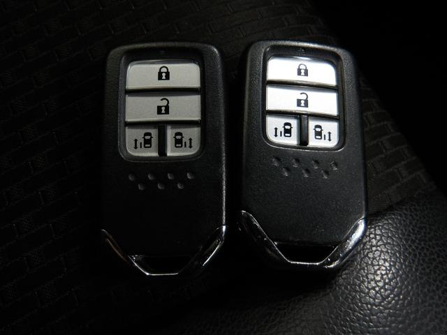 ステップワゴンスパーダ スパーダ・クールスピリットホンダセンシング　禁煙車　９インチ純正ナビ　ＥＴＣ　スマートキー　シートヒーター　Ｒカメラ　サイドエアバック　左右電動スライドドア　バックモニタ　地ＴＶ　ナビ＆ＴＶ　三列シート　助手席エアバッグ　ドライブレコーダ（15枚目）