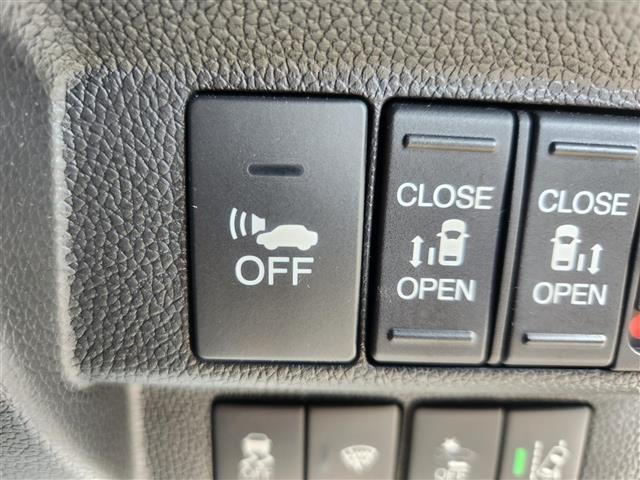 フリードハイブリッド ハイブリッド・EX 禁煙車 バックモニター アダプティブクルコン 衝突被害軽減 車線逸脱防止 誤発進抑制 LEDオートライト 純正9型ナビTV 両側パワスラ ビルトインETC 半革シート 前席シートヒーター スマートキー(4枚目)